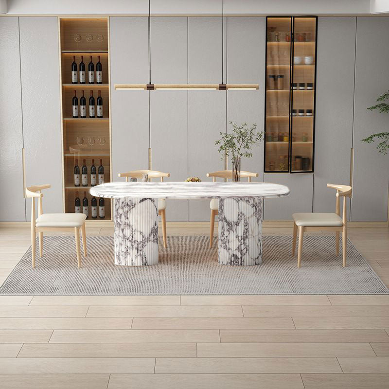 Calacatta Viola Marble Oval Dining Table with Fluted Round Marble Legs